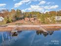 Waterfront home with private dock and beach access, aerial view at 109 Raspberry Ln, Mooresville, NC 28117