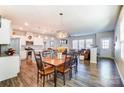 Open concept kitchen with stainless steel appliances and an island at 11532 Ruby Rose Ln, Davidson, NC 28036