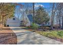Traditional home with an attached garage and long driveway at 161 Picwyck Dr, Mooresville, NC 28115