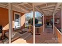 Back porch access with wooden deck and steps leading to the yard at 44339 Us 52 N Hwy, Richfield, NC 28137