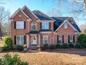 Two-story brick home with a covered entryway at 6922 Concord Hwy, Monroe, NC 28110