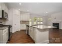 Modern kitchen featuring granite countertops and stainless steel appliances at 804 Pierce Ave, Mount Holly, NC 28120