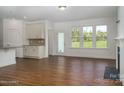 Spacious living room with hardwood floors and fireplace at 804 Pierce Ave, Mount Holly, NC 28120