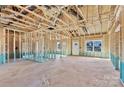 Interior framing of new home, showing open floor plan and wood framing at 816 Ryan St, Salisbury, NC 28144