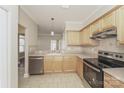 Spacious kitchen with light wood cabinets and stainless steel appliances at 19054 Long Pond Ln, Cornelius, NC 28031