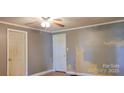 Simple bedroom with gray walls, ceiling fan, and hardwood floors at 3169 Eden Terrace Ext, Rock Hill, SC 29730