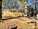 House exterior showcasing a front porch and mature trees at 3169 Eden Terrace Ext, Rock Hill, SC 29730