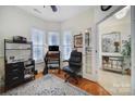 Home office with built-in shelving and hardwood floors at 3935 Yosemite Way, Fort Mill, SC 29707