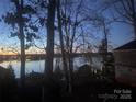 Evening lake view from lakeside property at 119 River Ridge Trl # E175/176, Mount Gilead, NC 27306
