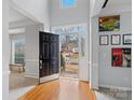 Bright entryway with hardwood floors and view to the street at 2609 Lamp Post Ln, Kannapolis, NC 28081