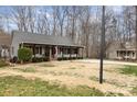 Exterior view of a well-maintained house with a cozy front porch at 348 Sugar Creek Xing, Fort Mill, SC 29715