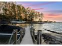 Private dock with boat lifts, perfect for lake access at 7542 Waterview Dr, Cornelius, NC 28031