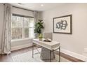 Charming home office features a large window and stylish desk at 12469 Copper Mountain Blvd, Charlotte, NC 28277