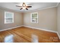 Bright bedroom with hardwood floors and ceiling fan at 2830 Royston Rd, Charlotte, NC 28208