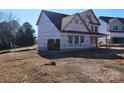 New two-story house under construction with a large front yard at 3215 Player Ct, Salisbury, NC 28144