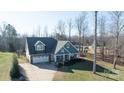 Aerial view of a teal house with a large yard and driveway at 3121 Glenmoor Rd, York, SC 29745