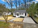 Newly renovated home with a spacious yard and new driveway at 409 Jones S Ave, Rock Hill, SC 29730