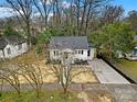 Cute cottage with new landscaping and a concrete driveway at 409 Jones S Ave, Rock Hill, SC 29730