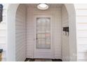 Quaint front entrance with a white door and mailbox at 1004 N Salisbury Ave, Spencer, NC 28159