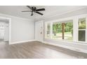 Bright living room featuring hardwood floors and large windows at 123 Lincoln St, Statesville, NC 28677