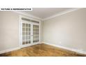 Spacious office with hardwood floors and French doors at 193 Asmodean Ln, Troutman, NC 28166