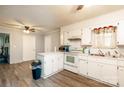 Spacious kitchen with modern appliances, lots of cabinets and adjacent breakfast bar at 2485 Nc Highway 109 S Hwy, Mount Gilead, NC 27306