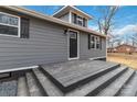 Gray house with black door and deck at 307 E Old Highway 74 None, Monroe, NC 28112