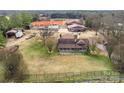 Aerial view of property showing home, barns, and riding arena at 375 W Rambo Rd, Rock Hill, SC 29730