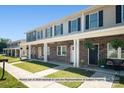 Row of townhomes with covered porches and landscaping at 3937 Newhall Dr, Hickory, NC 28601