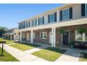 Row of townhomes with covered porches and stone accents at 3939 Newhall Dr, Hickory, NC 28601