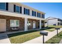 Two-story townhome with stone accents and covered porch at 3939 Newhall Dr, Hickory, NC 28601