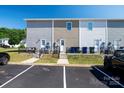 Rear view of townhomes showing private backyards and parking at 3939 Newhall Dr, Hickory, NC 28601