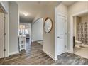 Bright and spacious entryway with hardwood floors and view of living room at 40196 Crooked Stick Dr, Lancaster, SC 29720