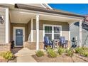 Charming front porch with seating area, perfect for relaxing at 40196 Crooked Stick Dr, Lancaster, SC 29720