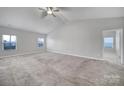 Large main bedroom with neutral walls and plush carpeting at 6104 Ahoskie Dr, Charlotte, NC 28215