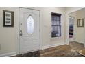 Bright entryway with hardwood floors and an elegant door at 1055 Cedar Hills Ln, Lancaster, SC 29720