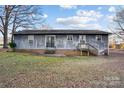 Home features a large backyard and patio at 12016 Ramah Church Rd, Huntersville, NC 28078