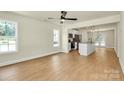 Open concept living area featuring hardwood floors and an eat-in kitchen at 1323 Christopher Cir, Rock Hill, SC 29730