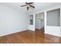 Spacious living room featuring hardwood floors and built-in shelving at 207 Lee St, Fort Mill, SC 29715