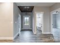Bright entryway with gray flooring and a view into the bathroom at 2434 Wo Gladden Rd, Chester, SC 29706