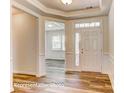 Bright entryway with hardwood floors and views to living areas at 4010 Cedar Falls Dr # 23, Waxhaw, NC 28173