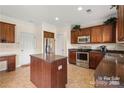 Spacious kitchen with an island and stainless steel appliances at 6107 Follow The Trl, Indian Trail, NC 28079