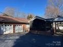 Two-car garage with screened porch and deck at 708 2Nd Nw Ave, Conover, NC 28613