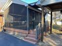 Spacious screened porch with wooden deck and steps at 708 2Nd Nw Ave, Conover, NC 28613