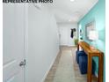 Bright hallway with wood-look floors and stylish console table at 1018 Hostler Ln, York, SC 29745