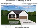 Charming single-story home with Aspen White siding, a two-car garage, and a manicured lawn at 143 Tranquility Ln, Harmony, NC 28634
