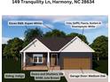 Exterior view showcases the home's indigo siding, jute brown doors and shutters, and aspen white trim at 149 Tranquility Ln, Harmony, NC 28634