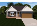 Charming single-story home with a symmetrical facade, attached garage, and well-maintained lawn at 149 Tranquility Ln, Harmony, NC 28634