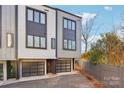 Modern townhome with attached garage and private driveway at 1927 W Trade St, Charlotte, NC 28216