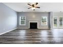 Living room featuring a fireplace and hardwood floors at 8331 Burgundy Ridge Dr, Harrisburg, NC 28075